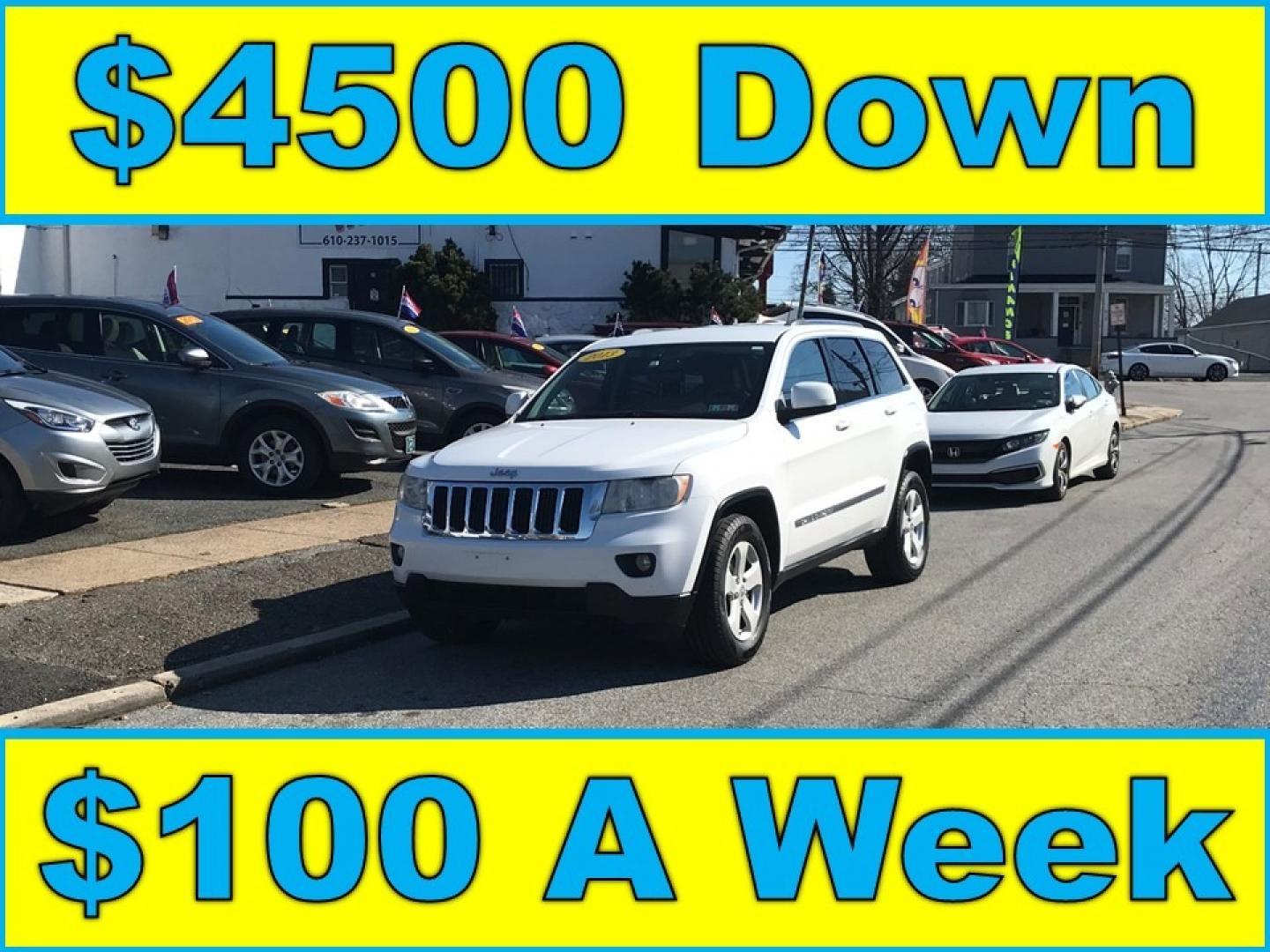 2013 White /Tan Jeep Grand Cherokee Laredo (1C4RJFAG6DC) with an 3.6 V6 engine, Automatic transmission, located at 577 Chester Pike, Prospect Park, PA, 19076, (610) 237-1015, 39.886154, -75.302338 - Photo#0